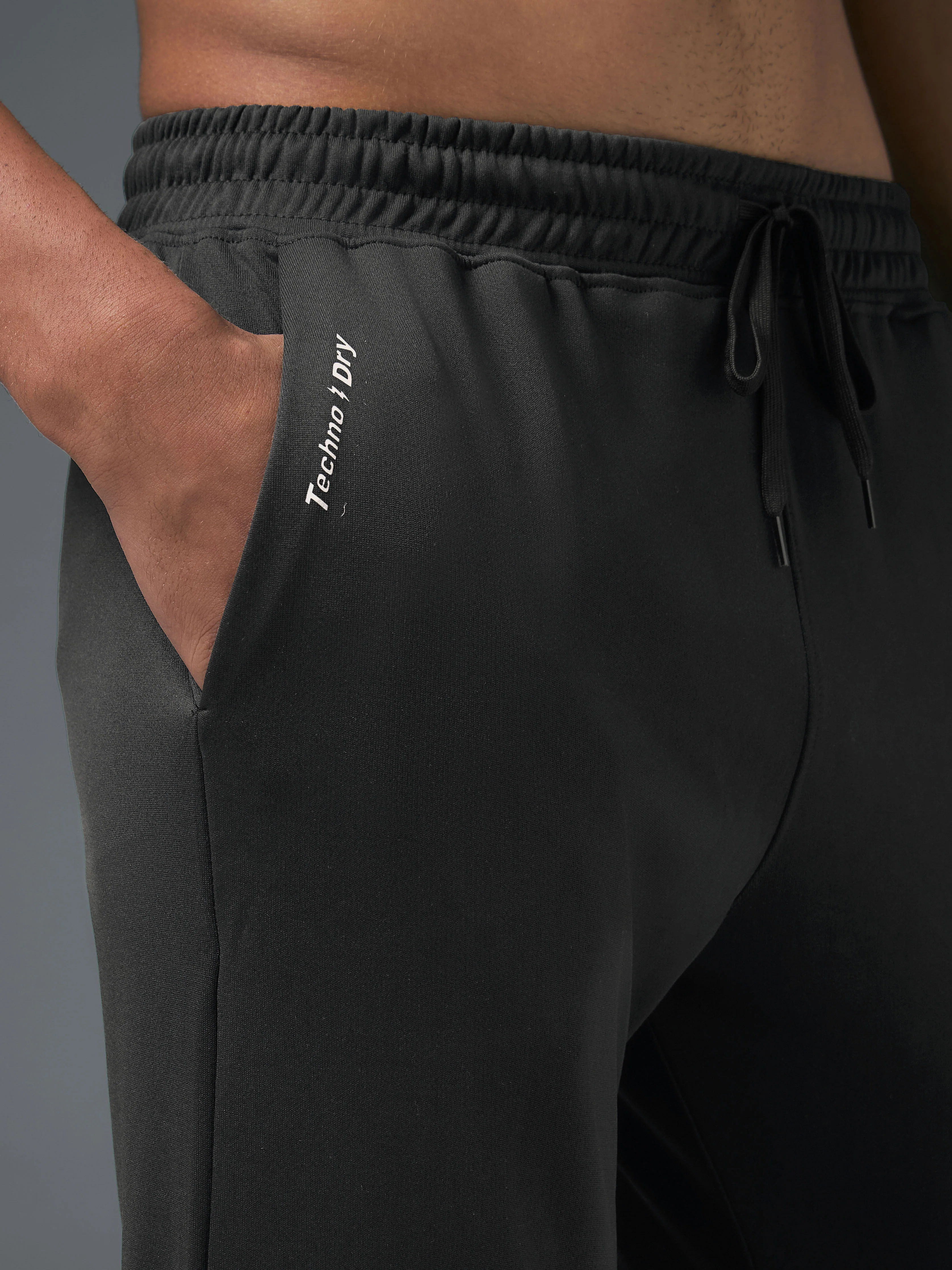 Men Melange Slim Fit Trackpants with TECHNO DRY - Image 6