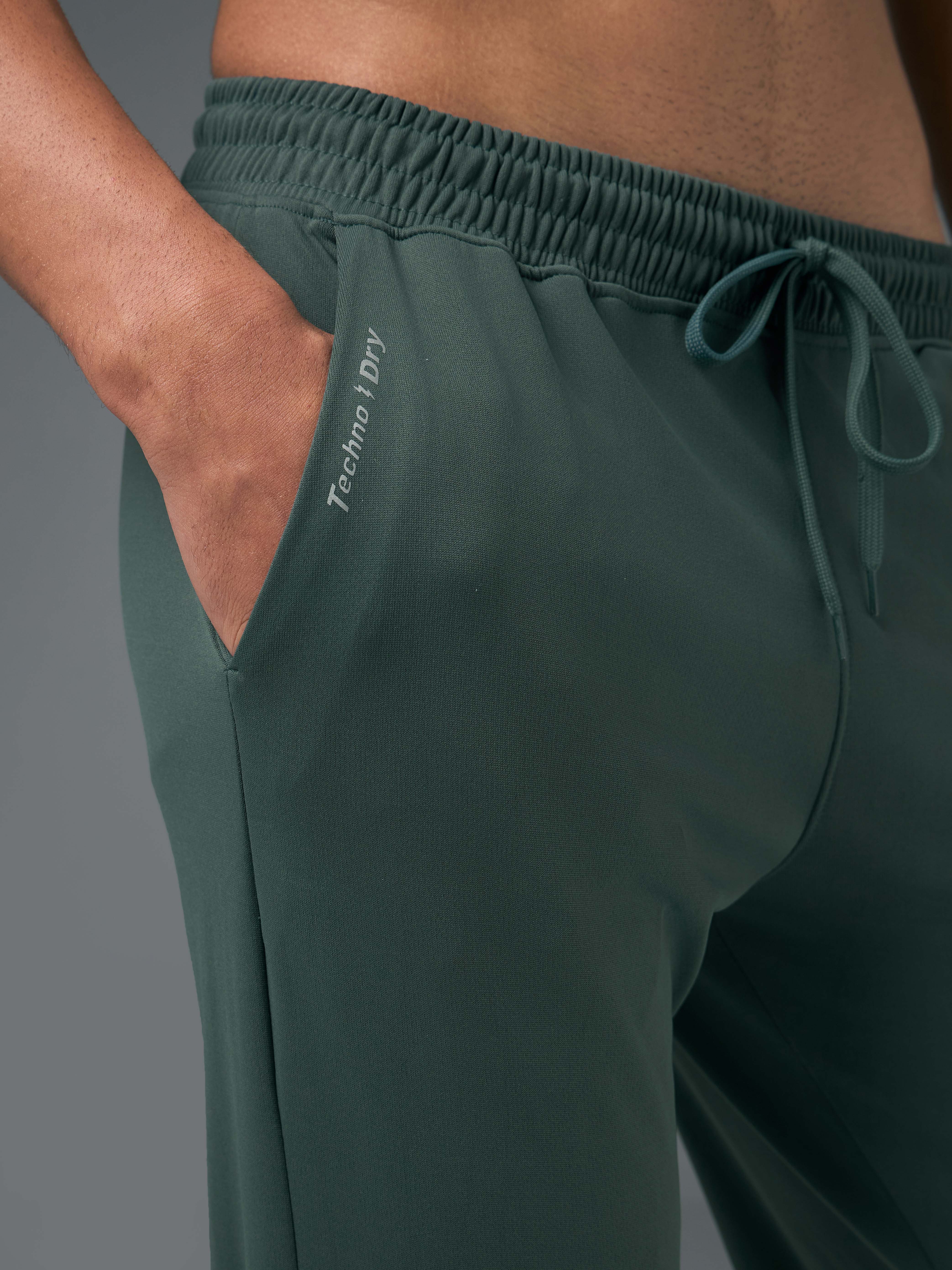 Men Melange Slim Fit Trackpants with TECHNO DRY - Image 7