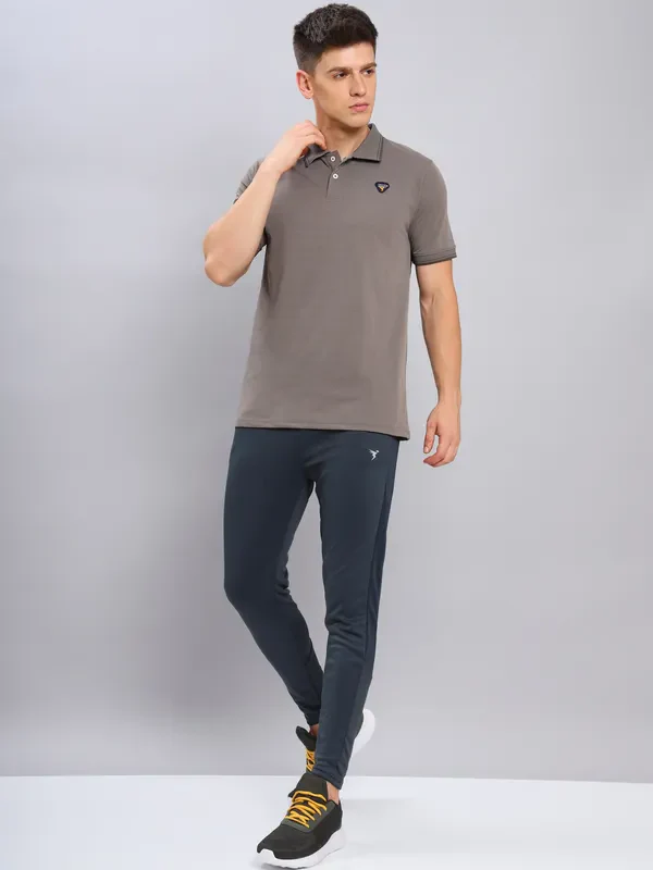 Men Solid Slim Fit Polo T-shirt with ELASTO PLUS - Image 4