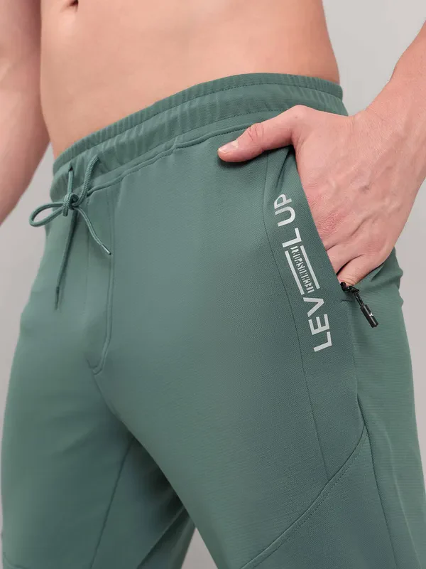 Men Solid Slim Fit Trackpants with TECHNO DRY - Image 6
