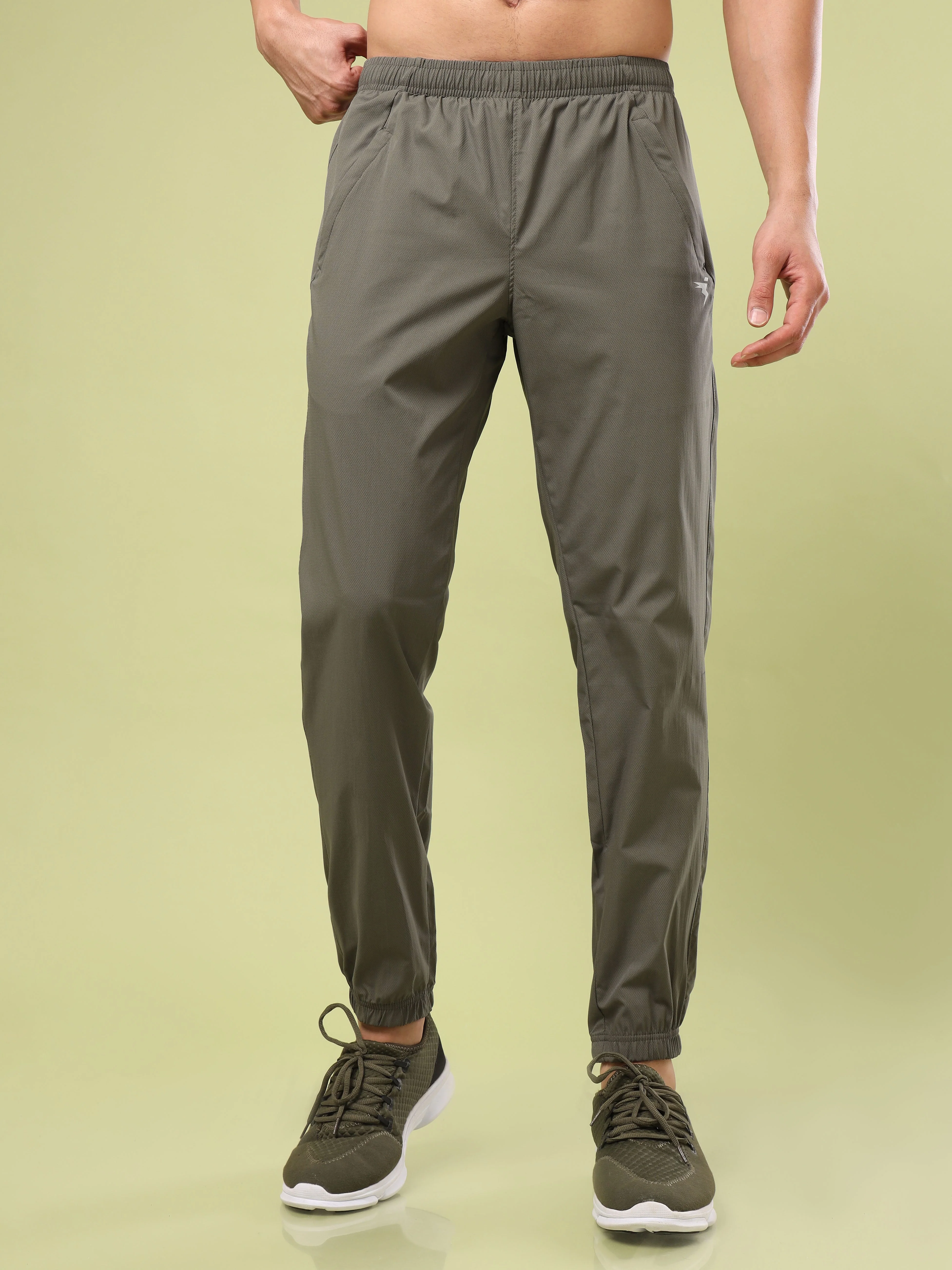 Men Solid Relax Fit Joggers with TECHNOLITE