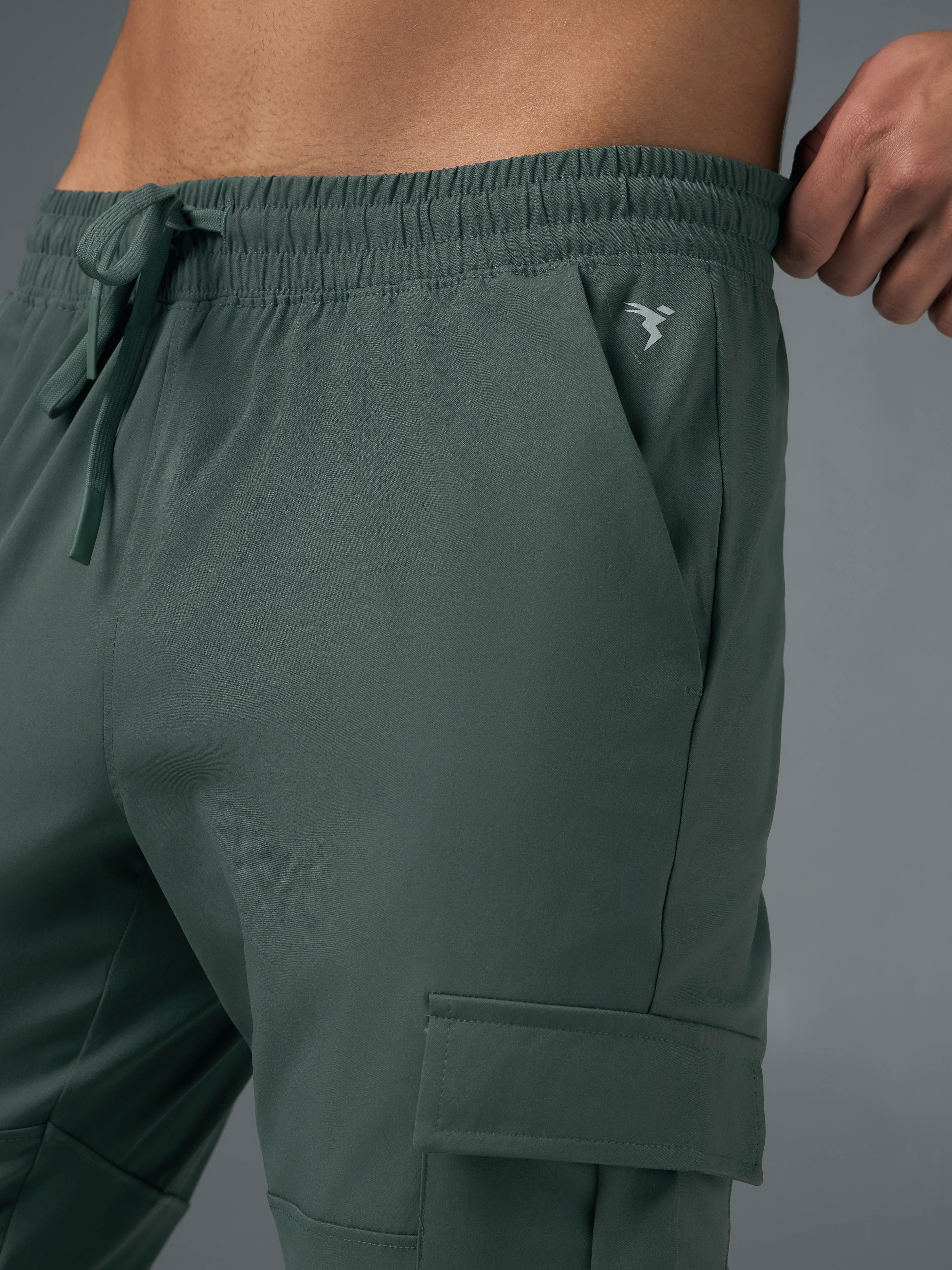 Men Solid Relax Fit Sports Cargo Trackpants with TS FLEXI - Image 6