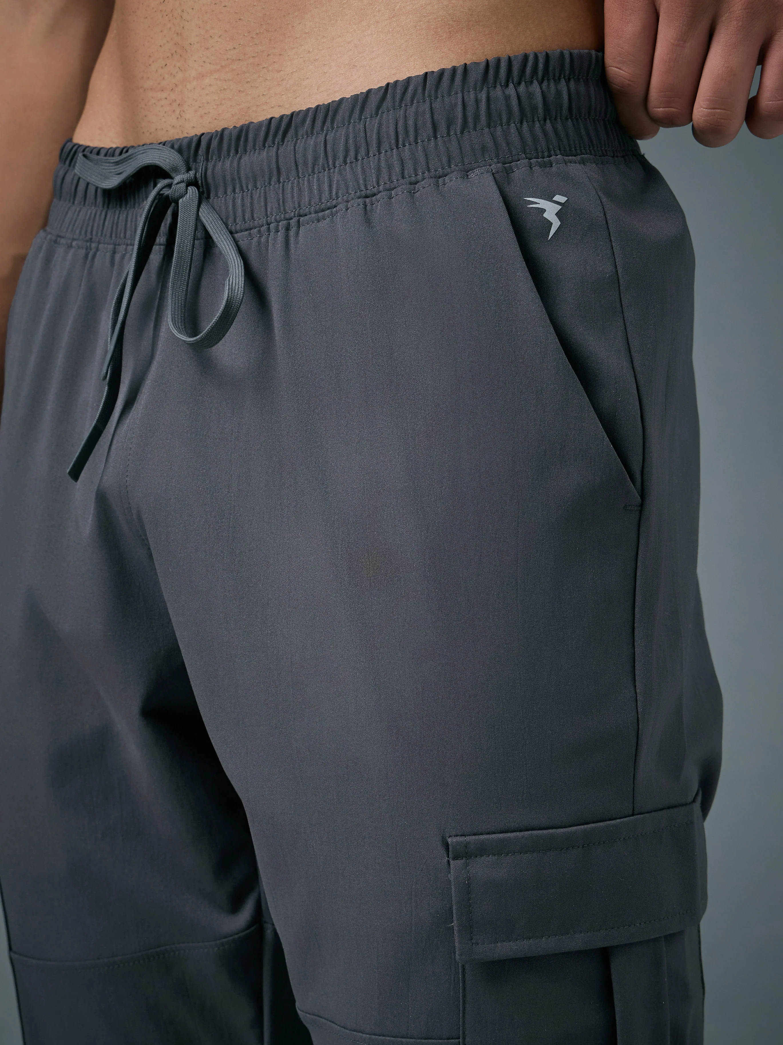 Men Solid Relax Fit Sports Cargo Trackpants with TS FLEXI - Image 6