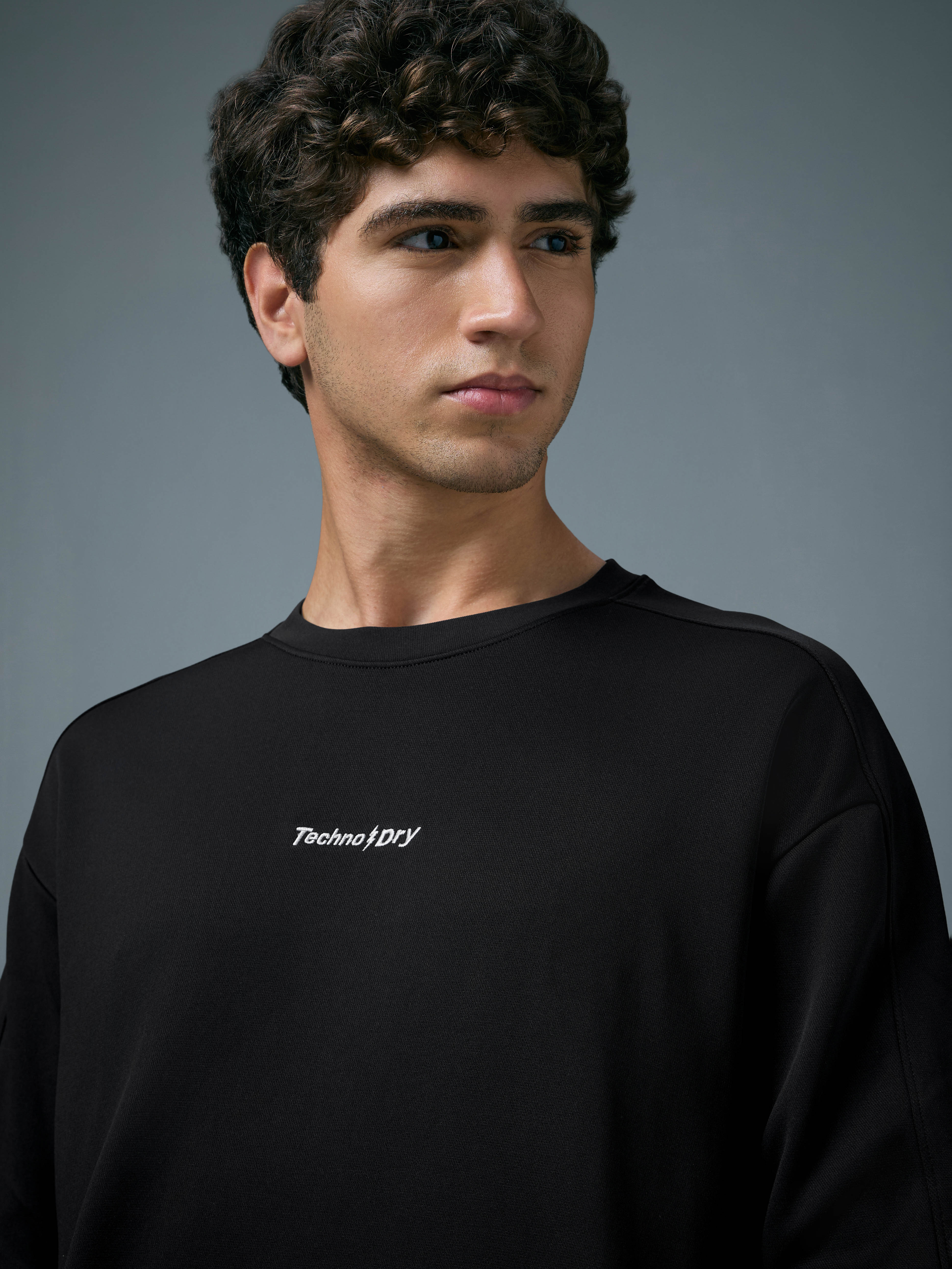 Men Solid Slim Fit Round Neck Sports Sweatshirt with ELASTOPLUS - Image 6