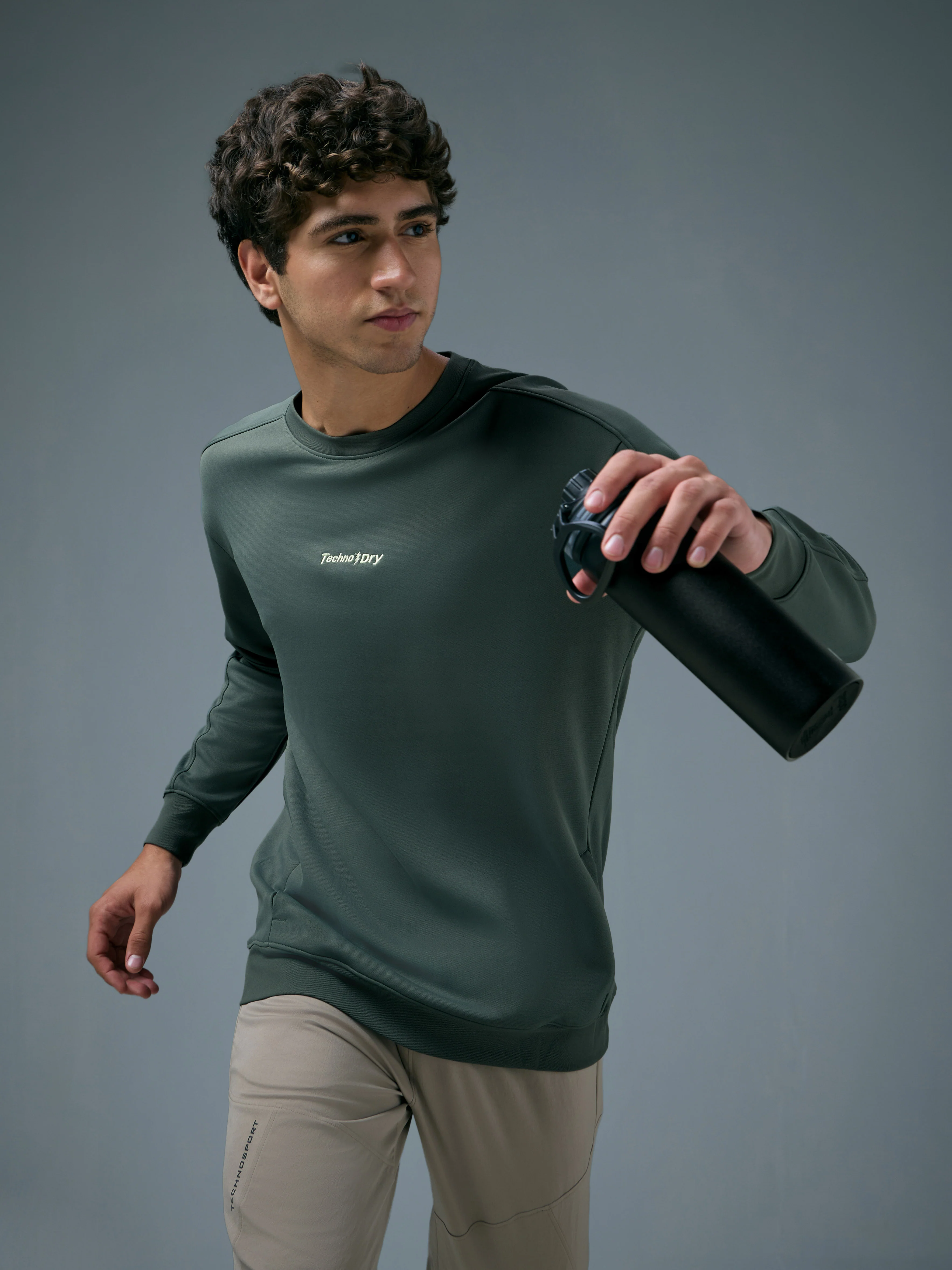 Men Solid Slim Fit Round Neck Sports Sweatshirt with ELASTOPLUS