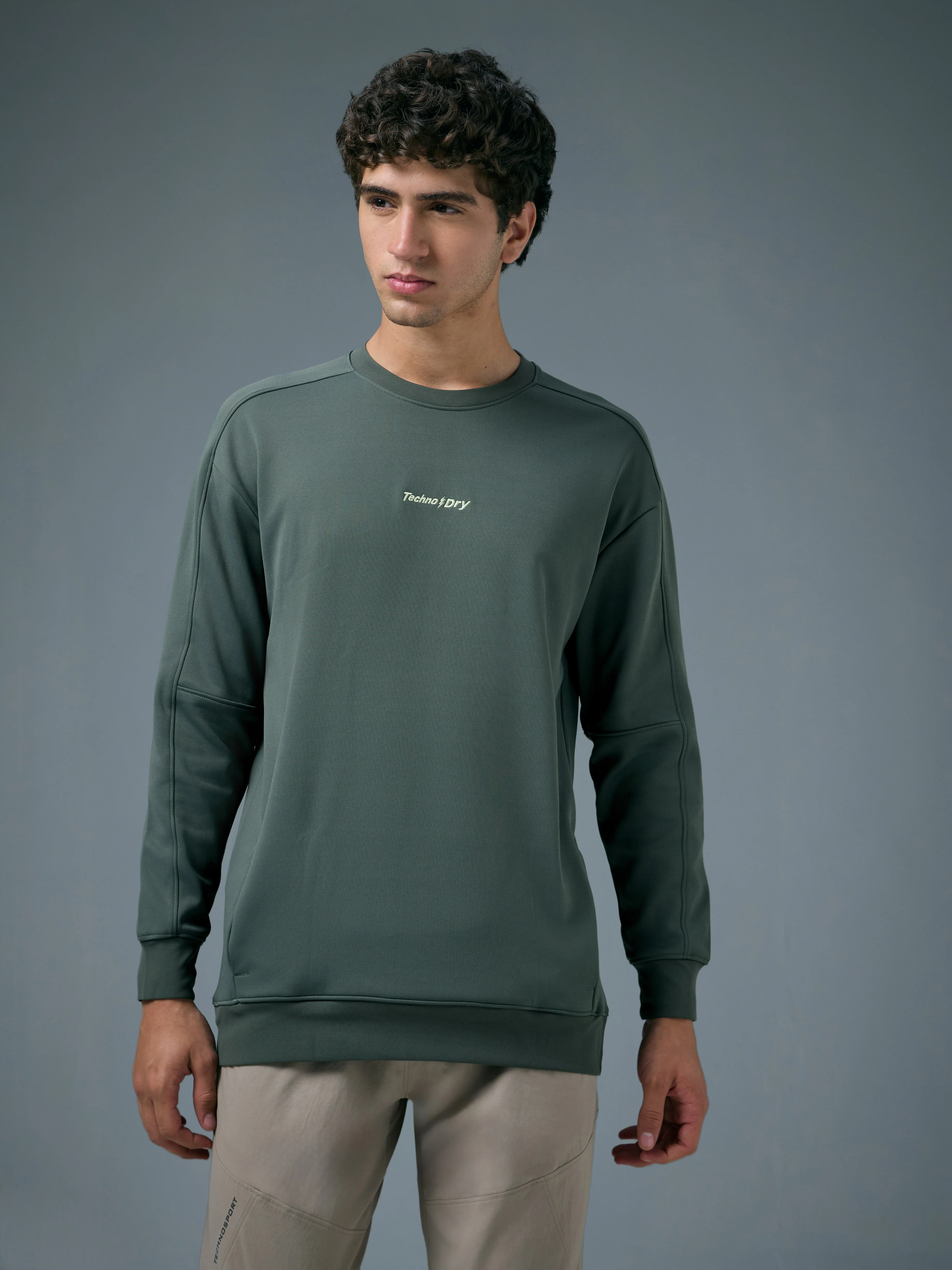 Men Solid Slim Fit Round Neck Sports Sweatshirt with ELASTOPLUS - Image 2