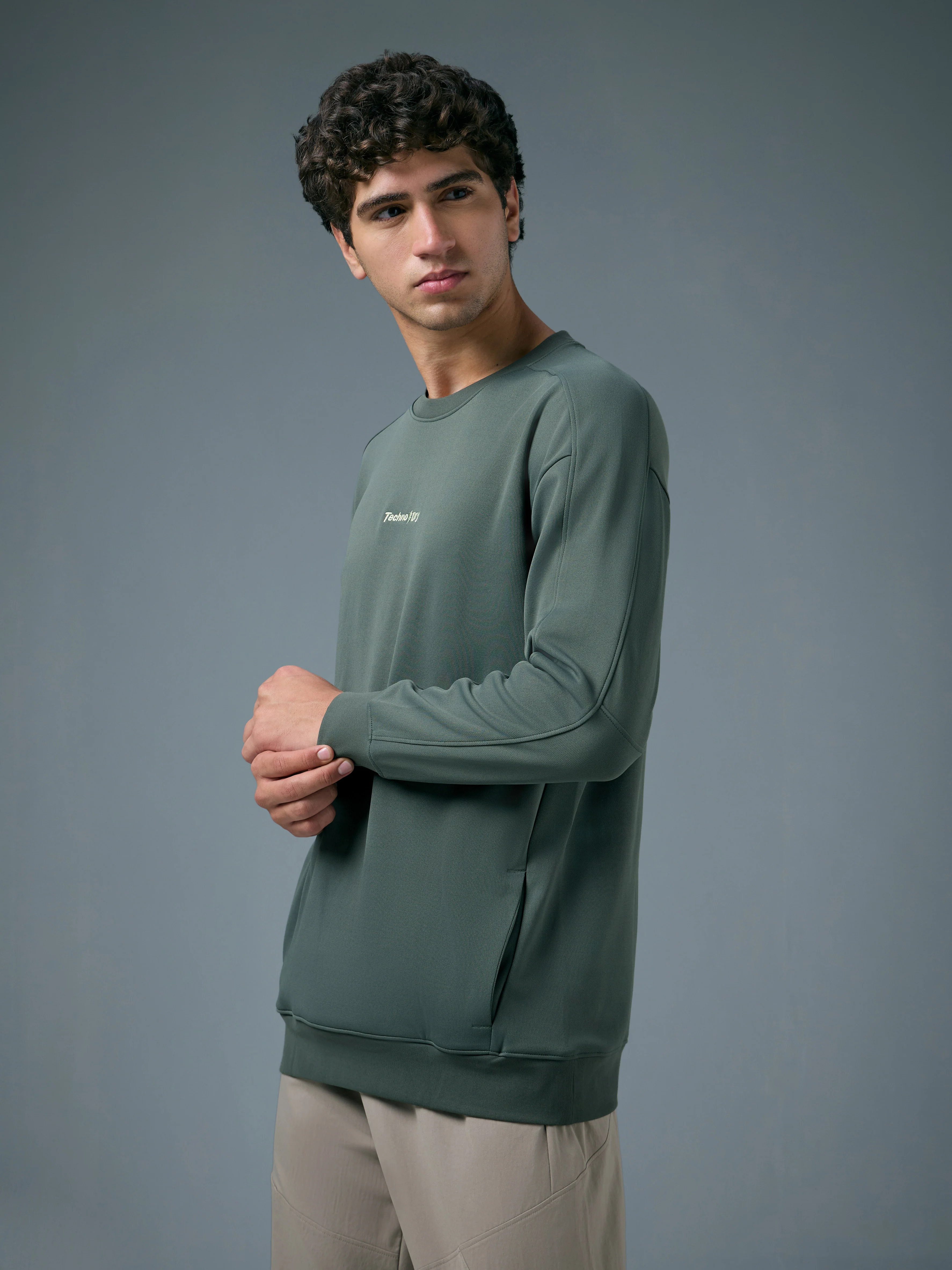 Men Solid Slim Fit Round Neck Sports Sweatshirt with ELASTOPLUS - Image 4