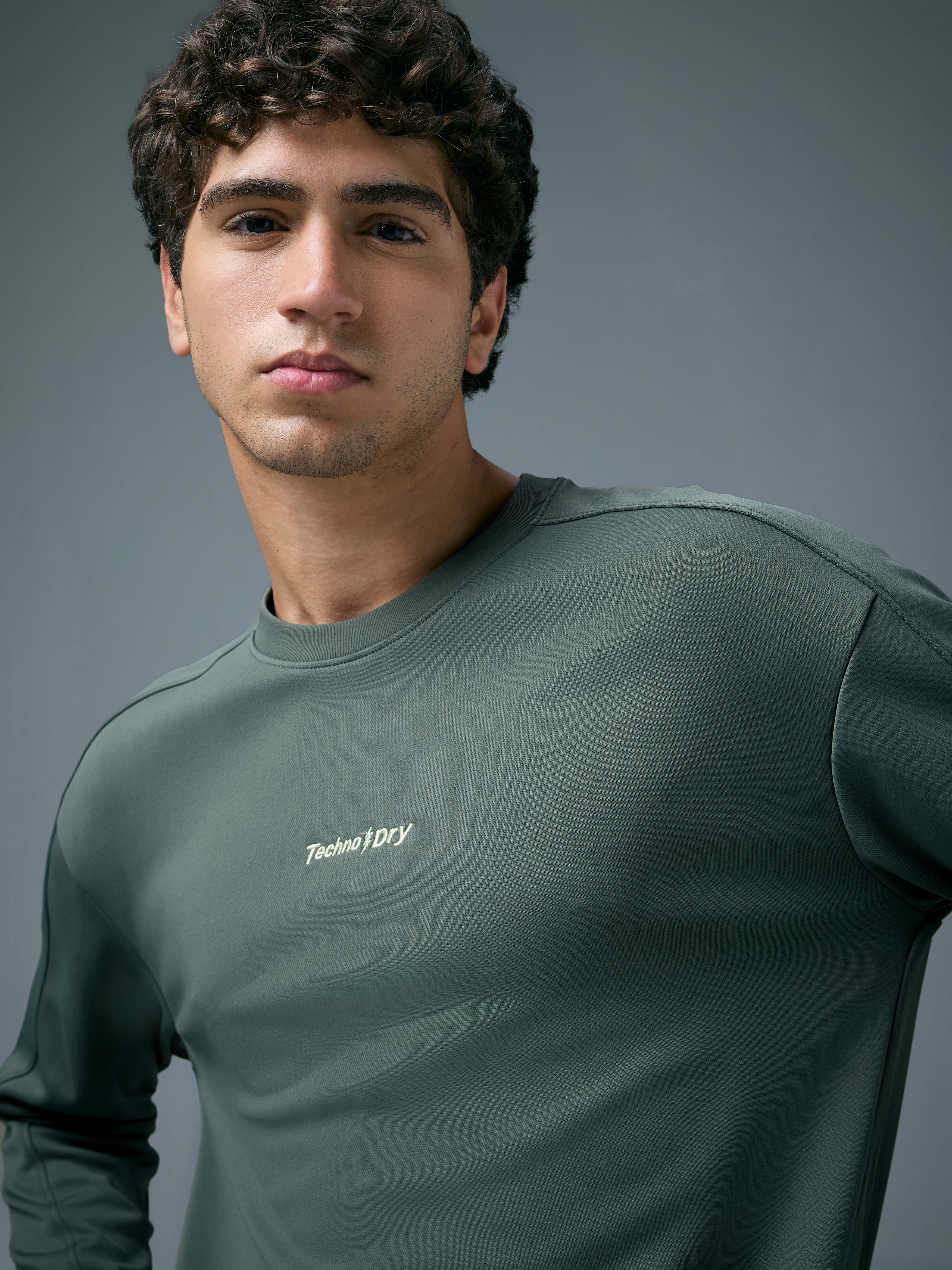 Men Solid Slim Fit Round Neck Sports Sweatshirt with ELASTOPLUS - Image 6
