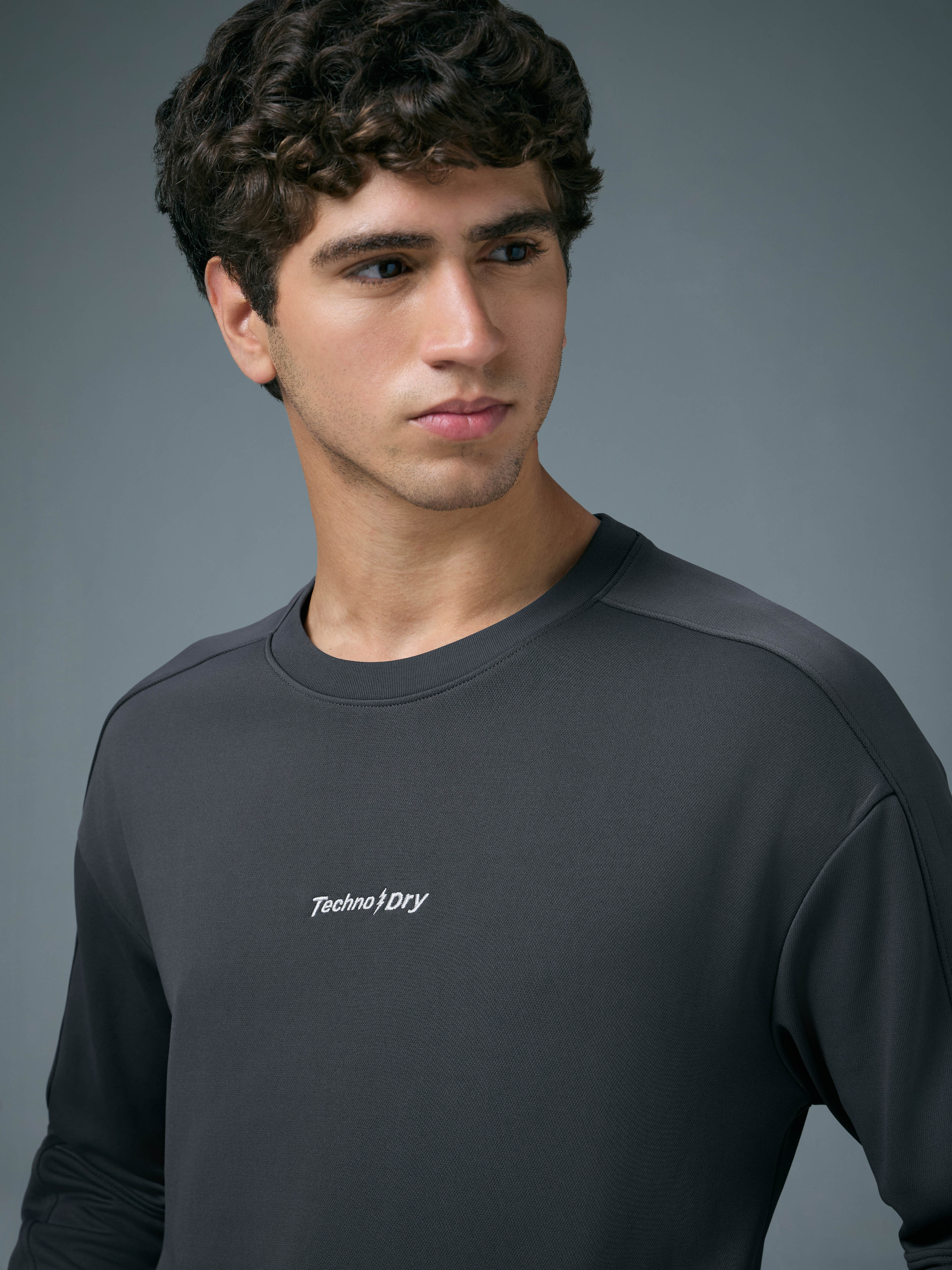 Men Solid Slim Fit Round Neck Sports Sweatshirt with ELASTOPLUS - Image 6