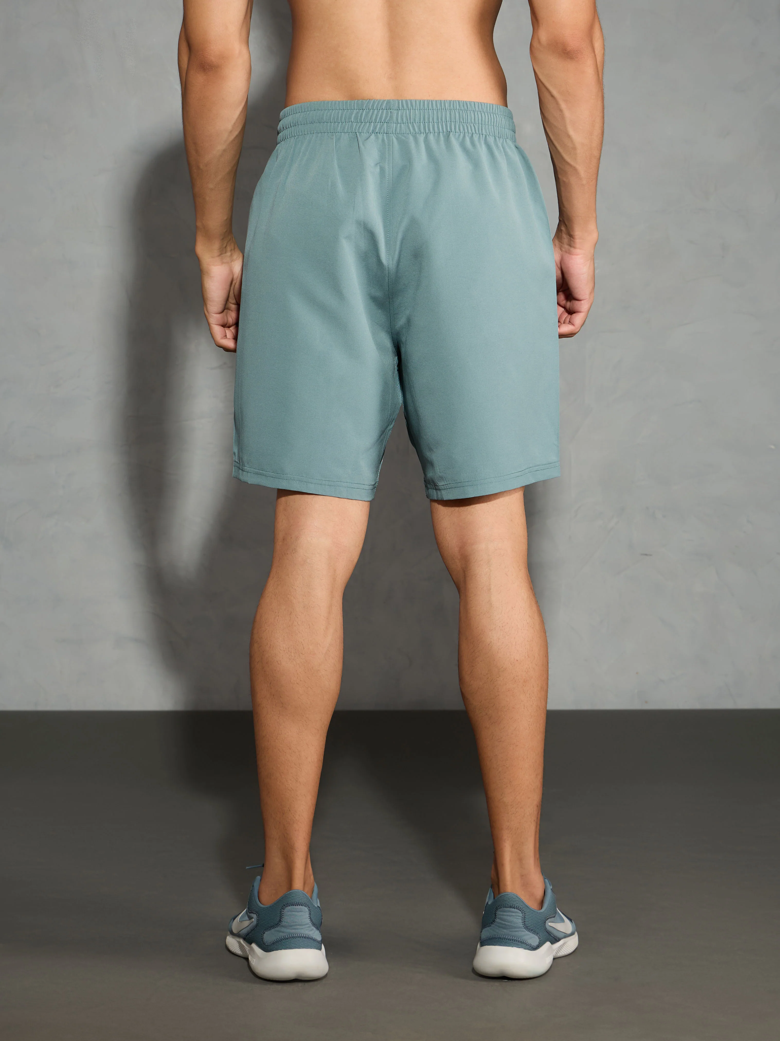 Men Solid Slim Fit Shorts with TECHNOLITE - Image 4