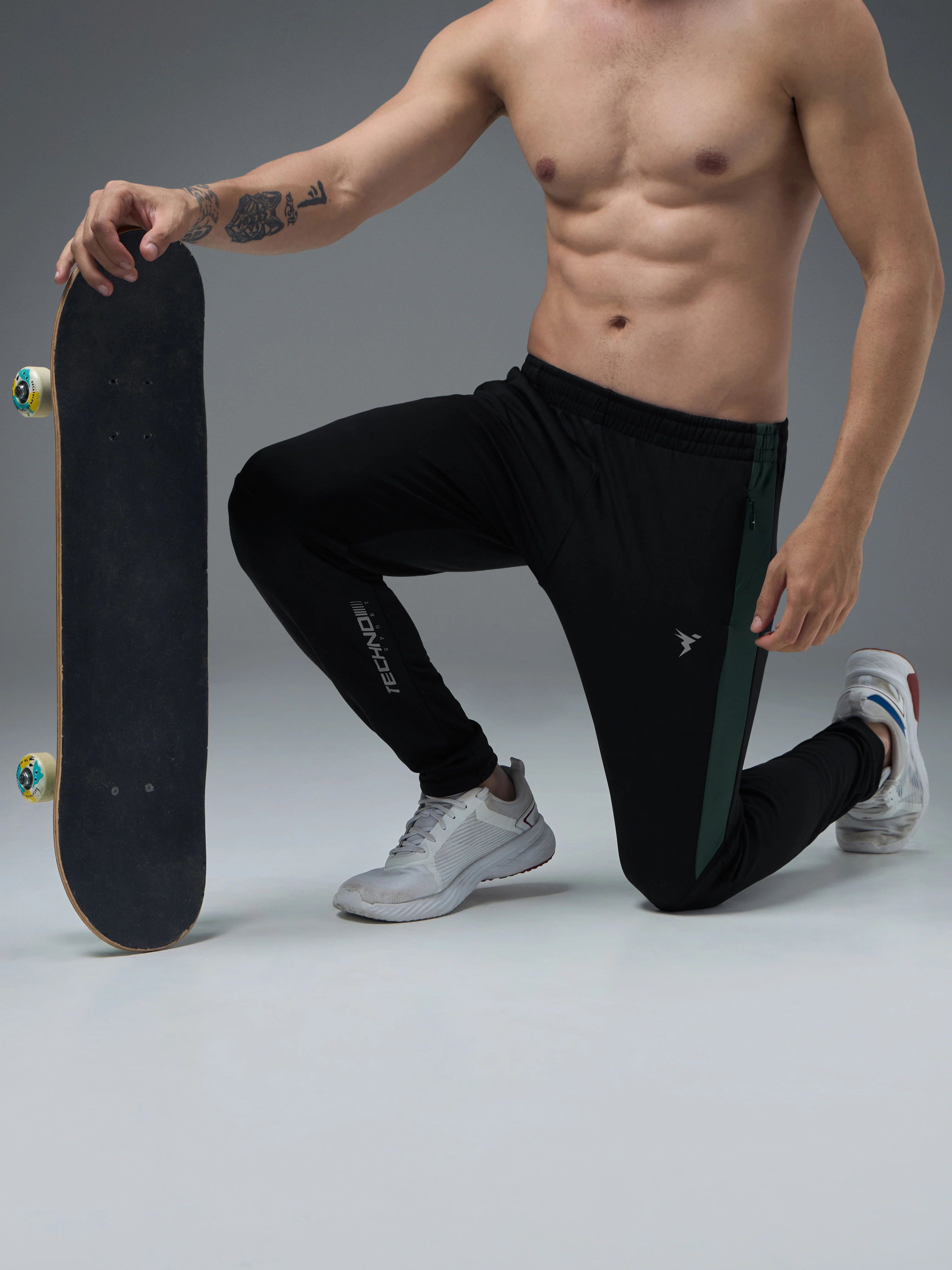 Men Solid Slim Fit Trackpants with TECHNO DRY