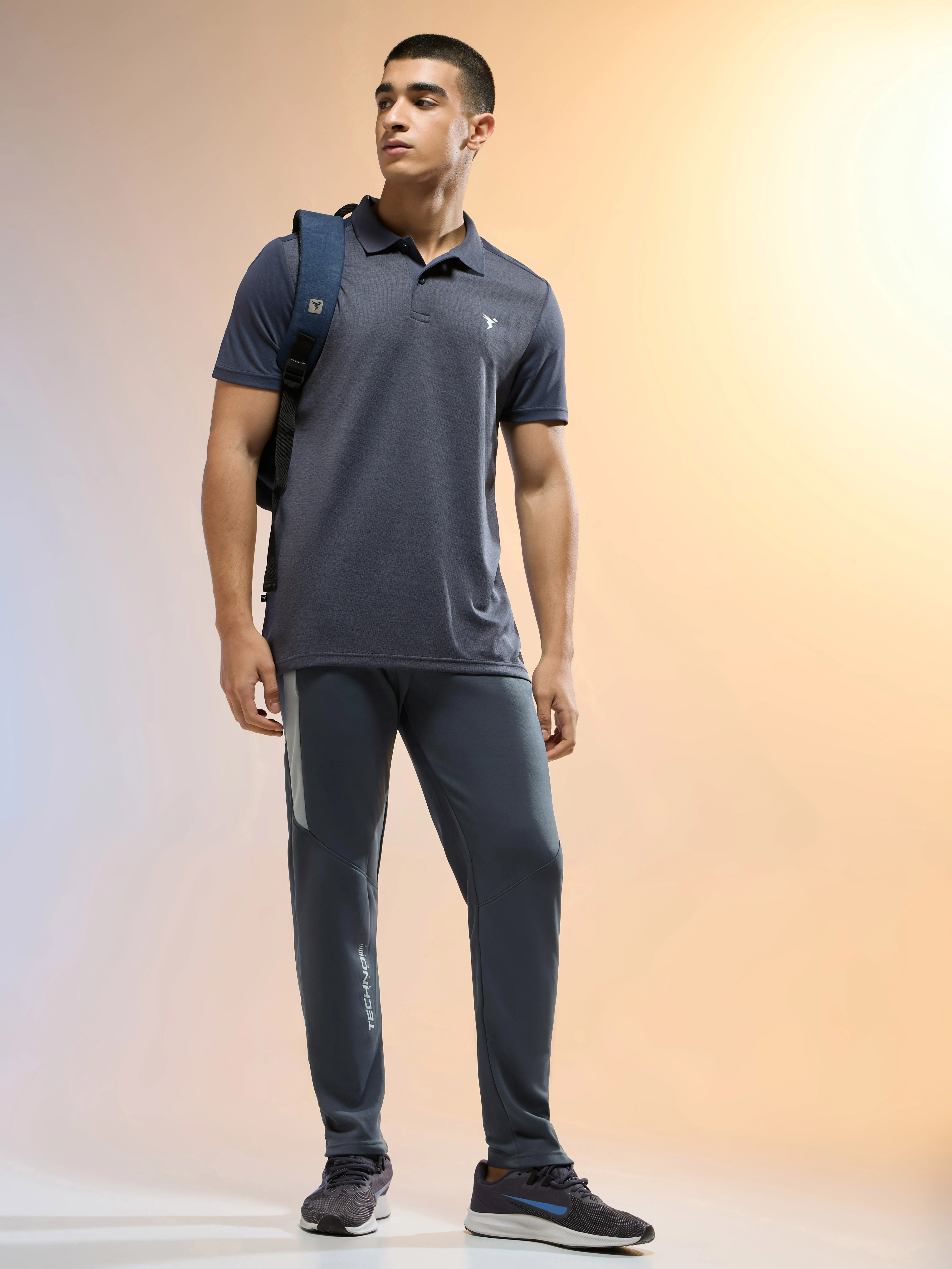 Men Solid Slim Fit Trackpants with TECHNO DRY - Image 4