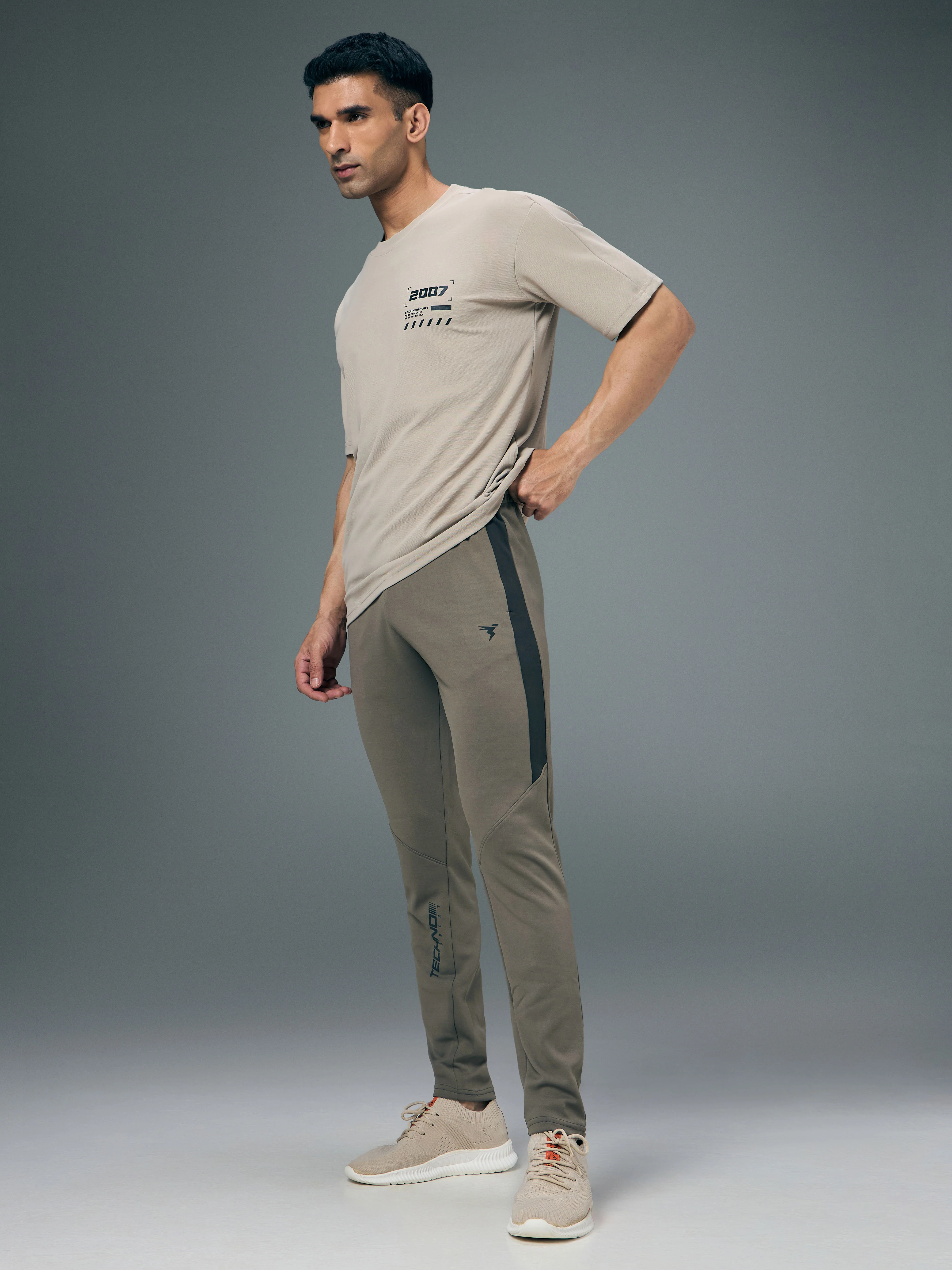 Men Solid Slim Fit Trackpants with TECHNO DRY - Image 5