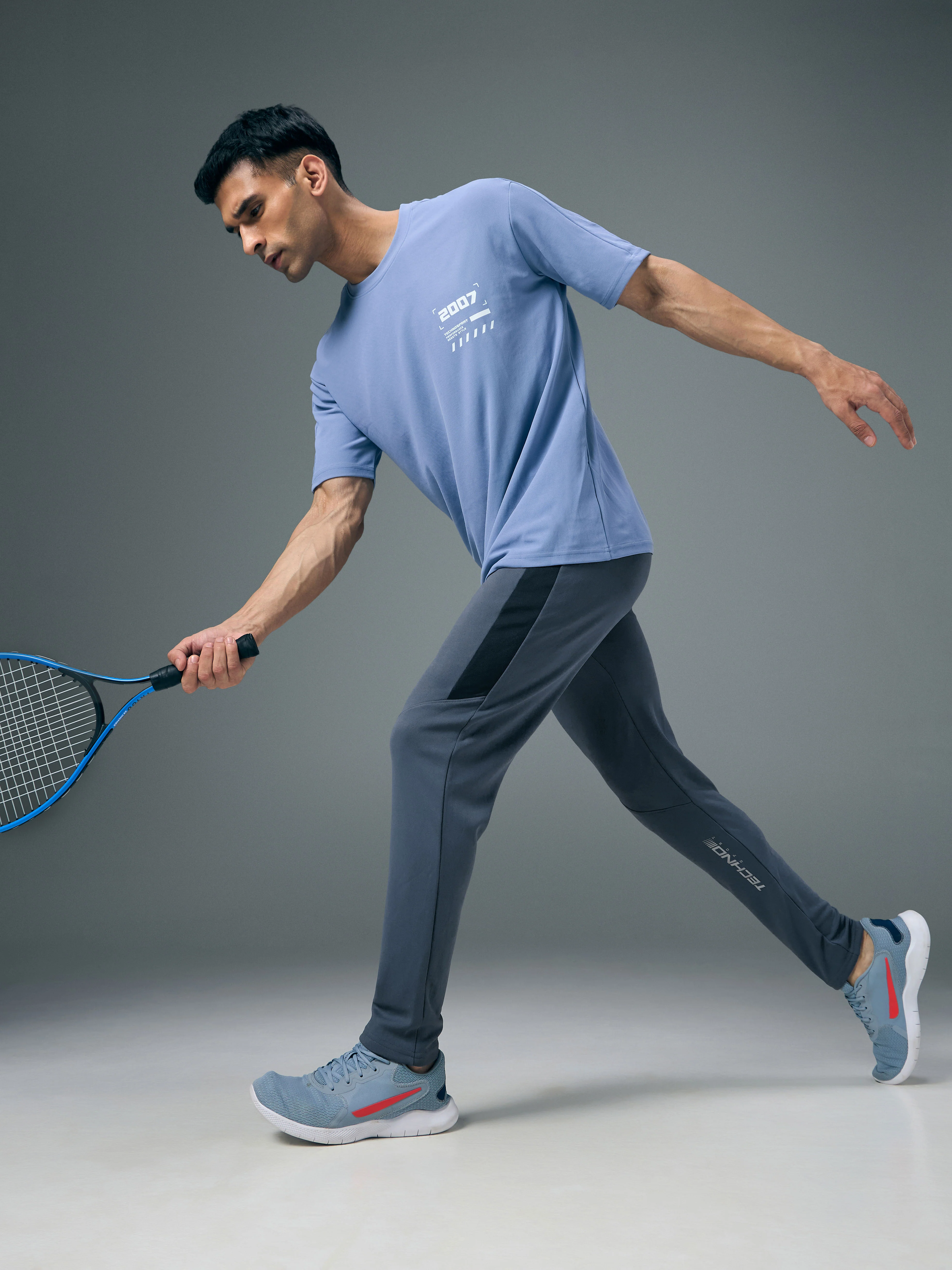 Men Solid Slim Fit Trackpants with TECHNO DRY - Image 5