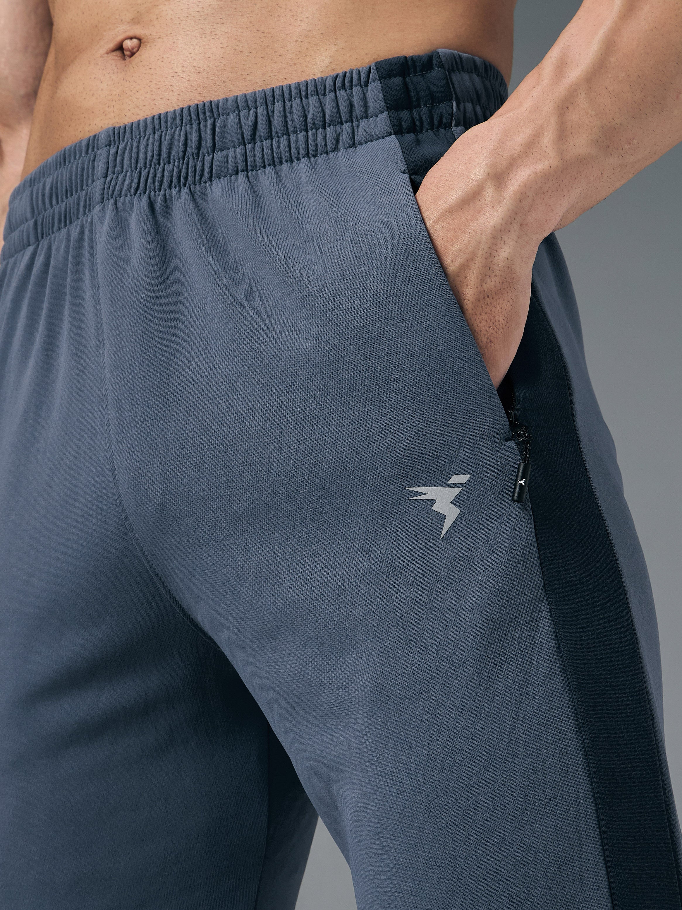 Men Solid Slim Fit Trackpants with TECHNO DRY - Image 6