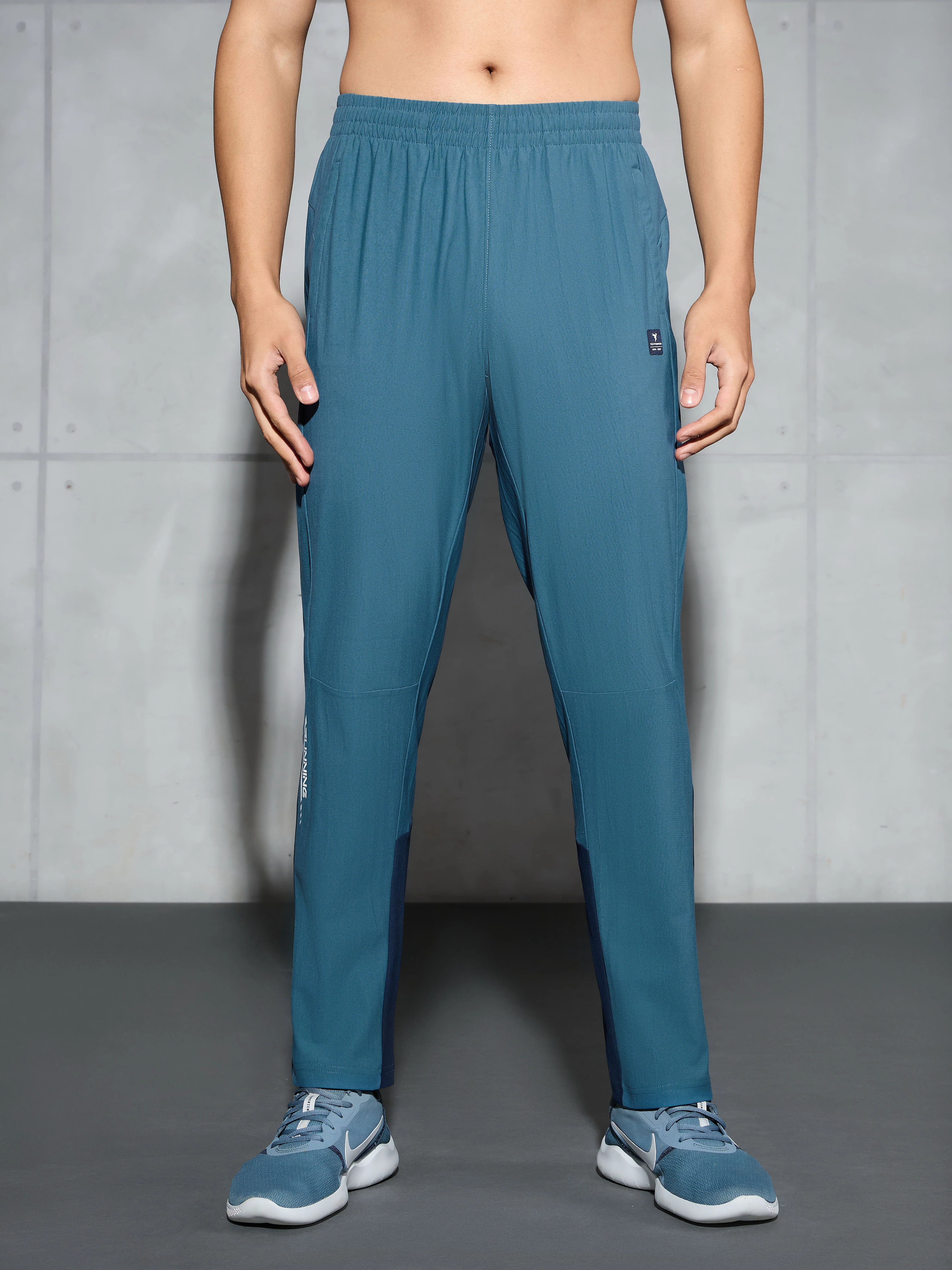 Men Solid Straight Fit Sports Trackpants with DURACOOL+ - Image 2