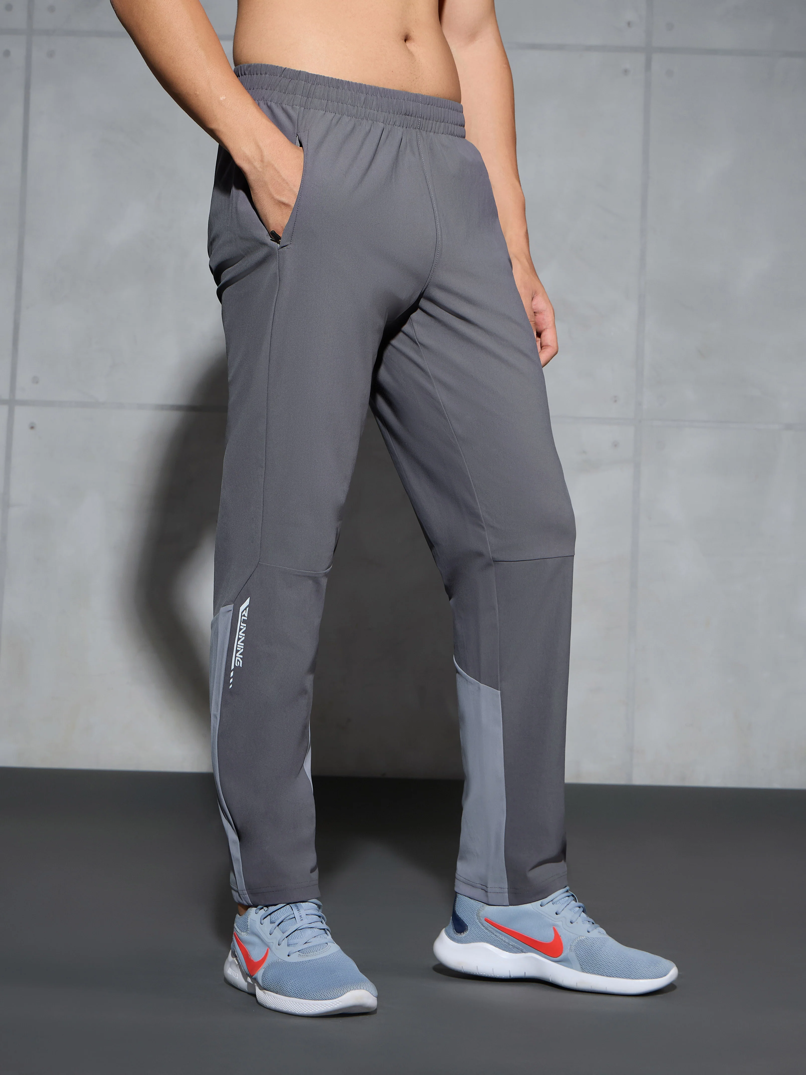 Men Solid Straight Fit Sports Trackpants with DURACOOL+ - Image 4