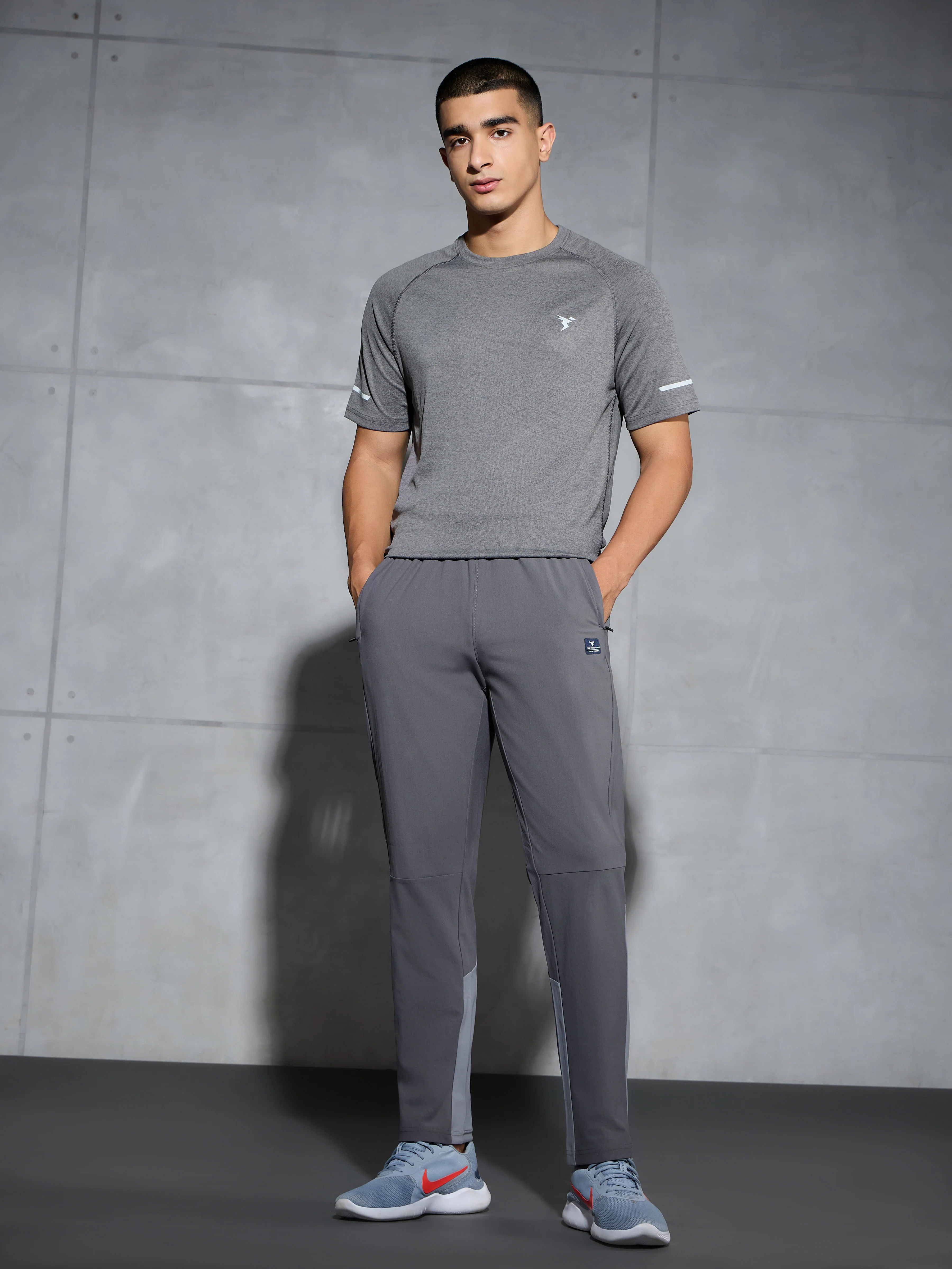 Men Solid Straight Fit Sports Trackpants with DURACOOL+ - Image 5