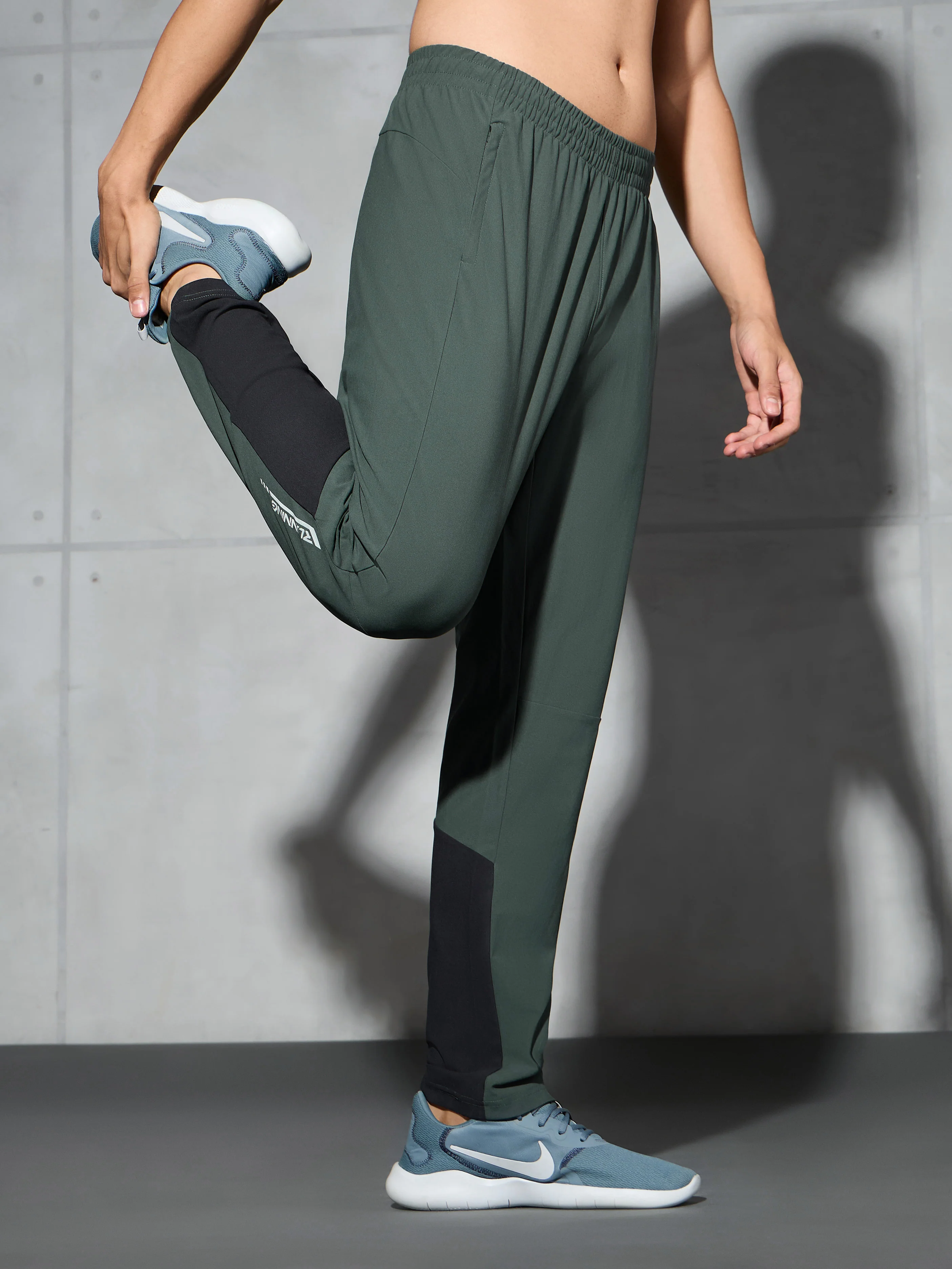Men Solid Straight Fit Sports Trackpants with DURACOOL+