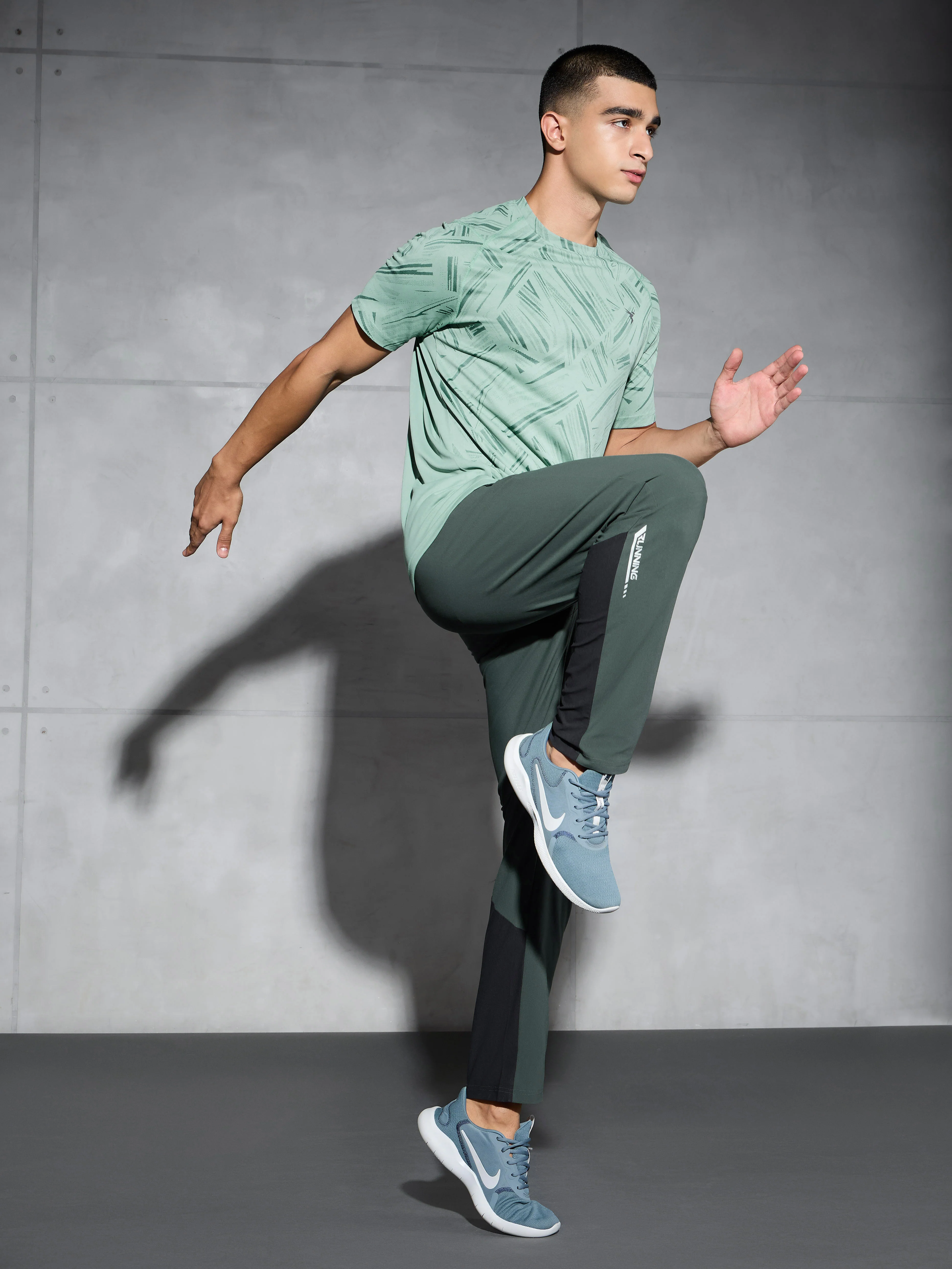 Men Solid Straight Fit Sports Trackpants with DURACOOL+ - Image 5