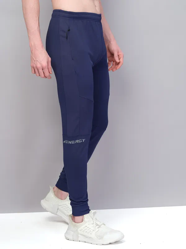 Men Solid Slim Fit Trackpants with TECHNO GUARD - Image 5