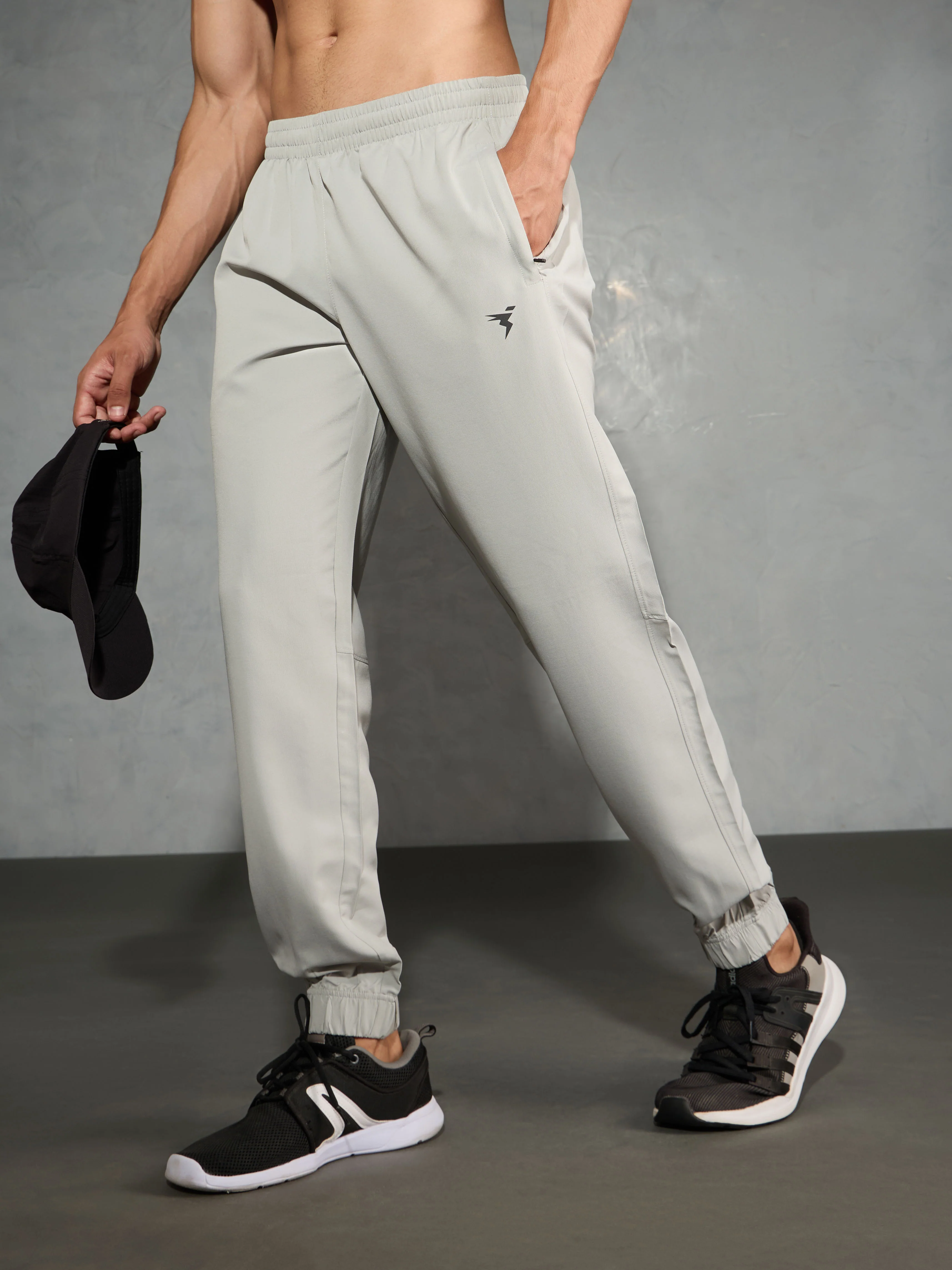 Men Solid Relax Fit Joggers with TECHNOLITE
