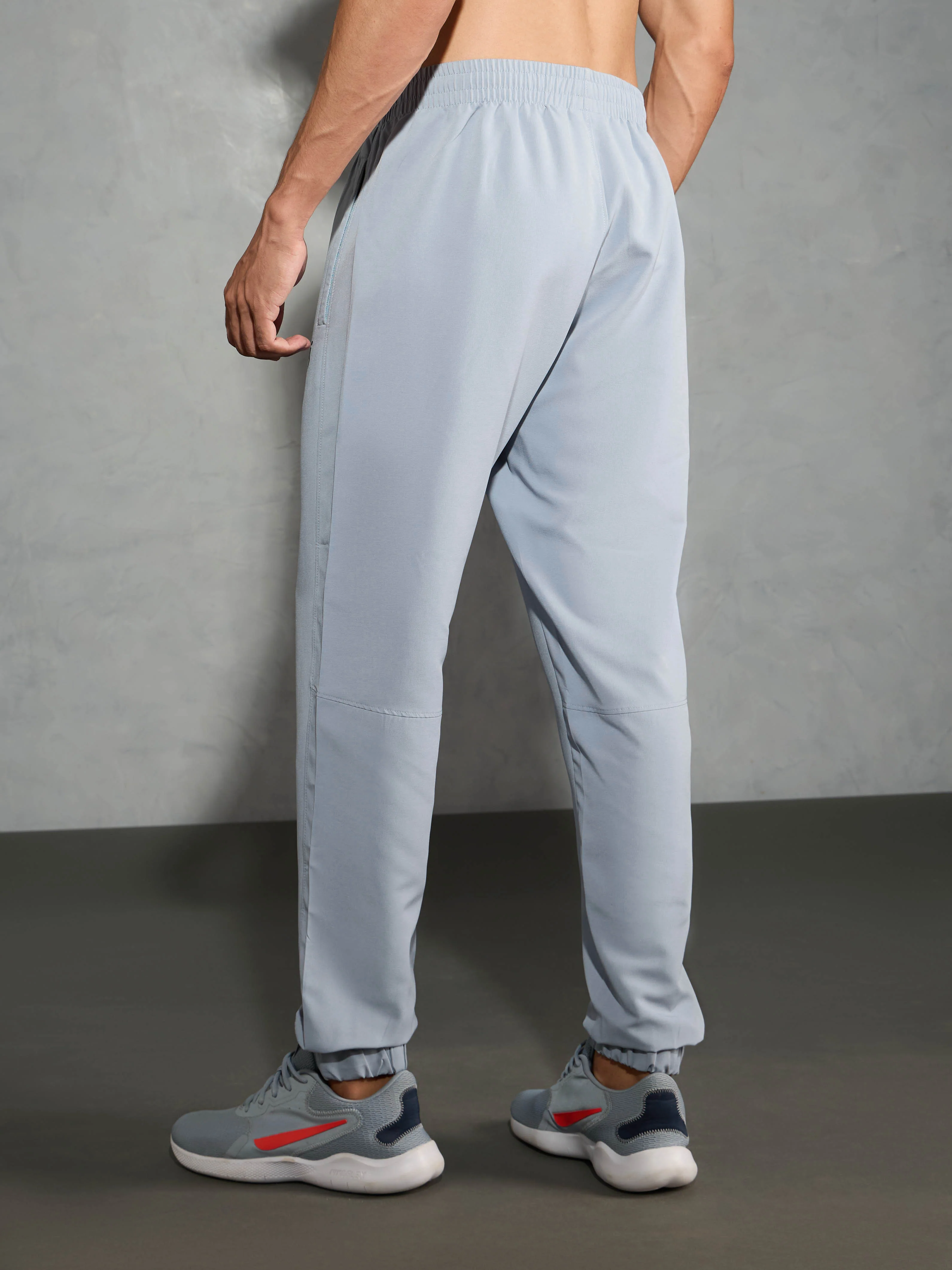 Men Solid Relax Fit Joggers with TECHNOLITE - Image 3