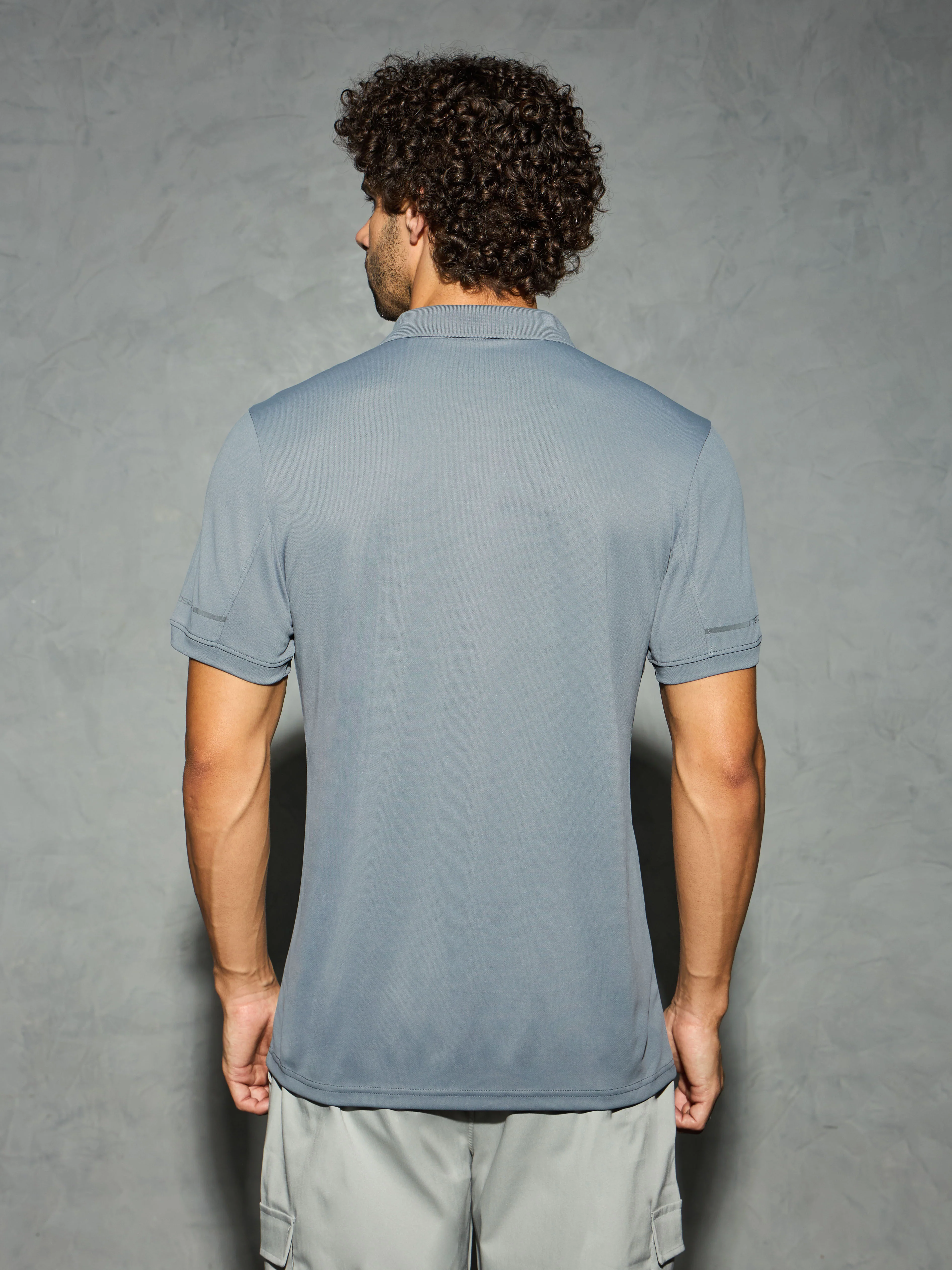 Men Solid Slim Fit Polo T-shirt with TECHNO COOL+ - Image 3