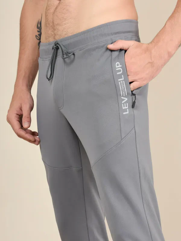 Men Solid Slim Fit Trackpants with TECHNO DRY - Image 6