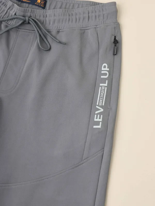 Men Solid Slim Fit Trackpants with TECHNO DRY - Image 8