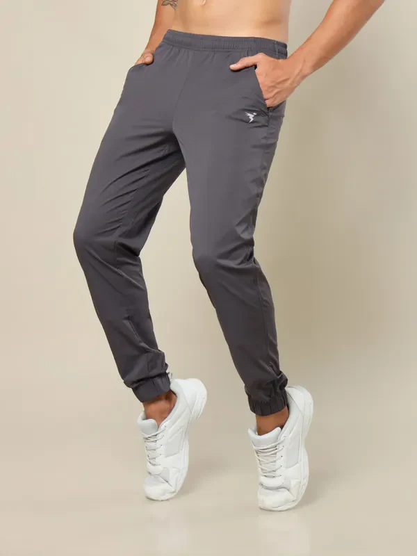 Men Solid Relax Fit Joggers with TECHNOLITE