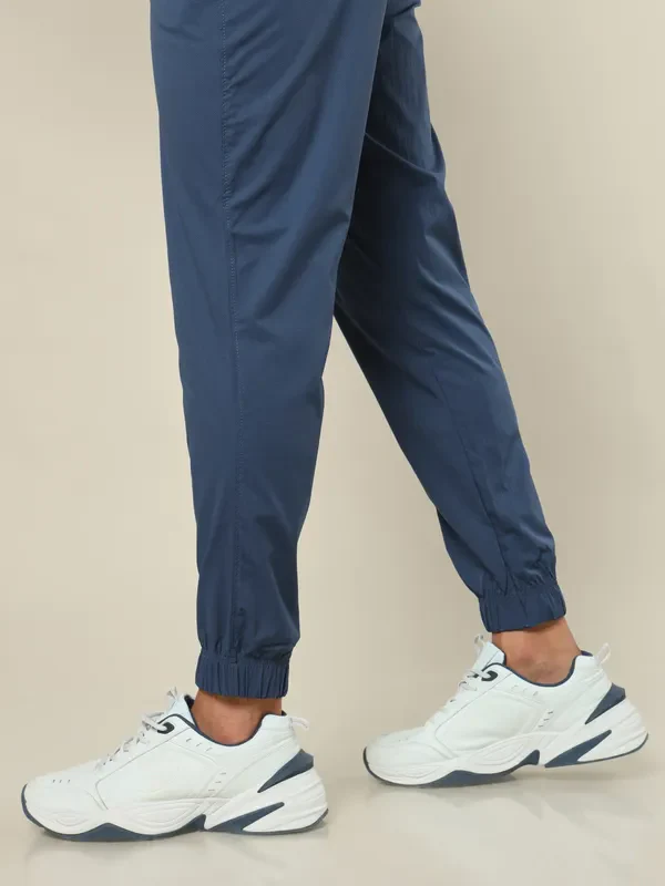 Men Solid Relax Fit Joggers with TECHNOLITE - Image 7