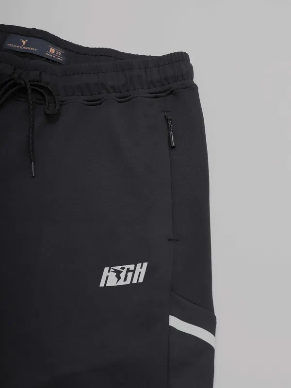 Men Solid Slim Fit Tracksuits with ELASTO LITE - Image 4