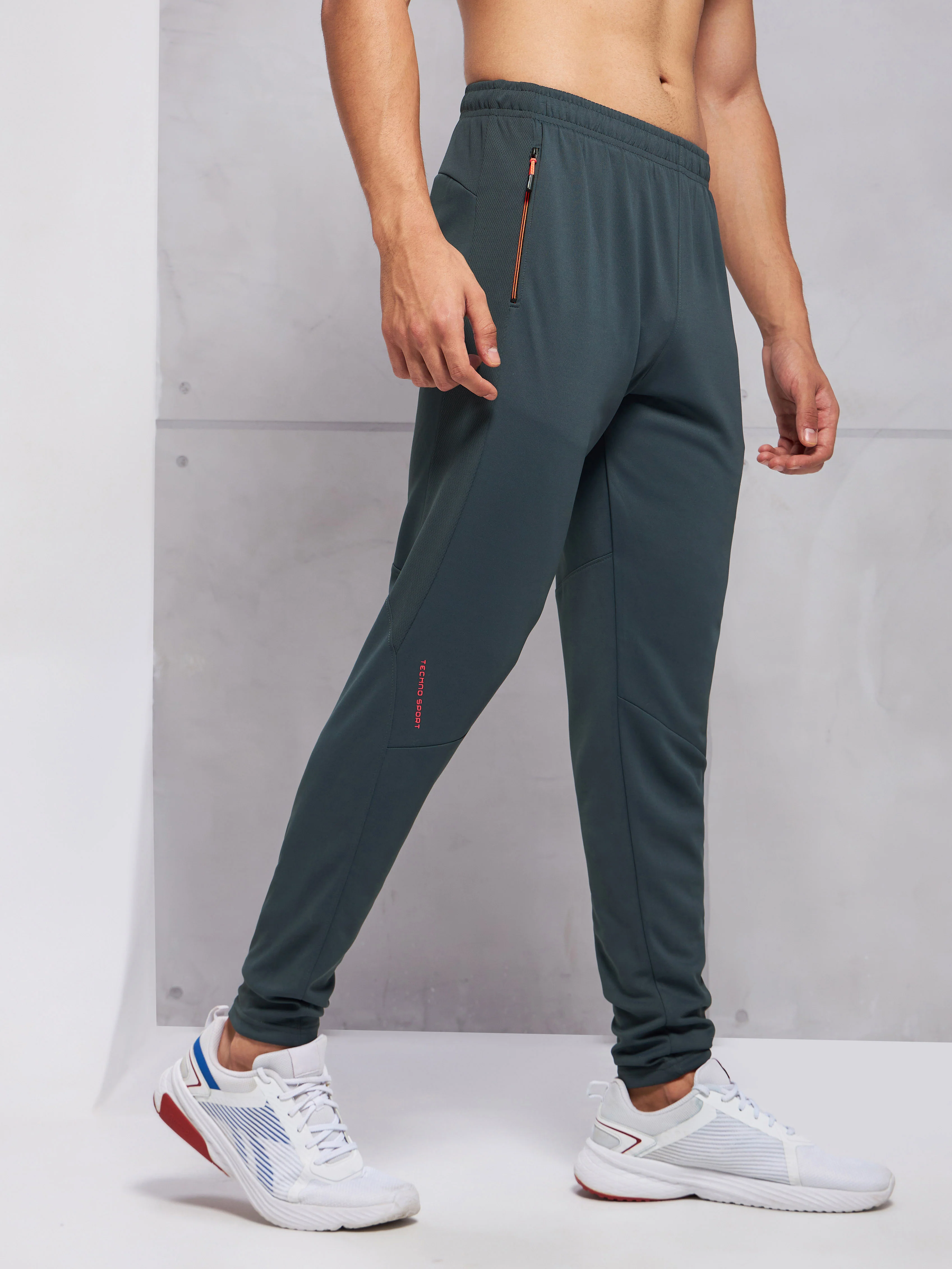 Men Solid Slim Fit Trackpants with TECHNO DRY - Image 4