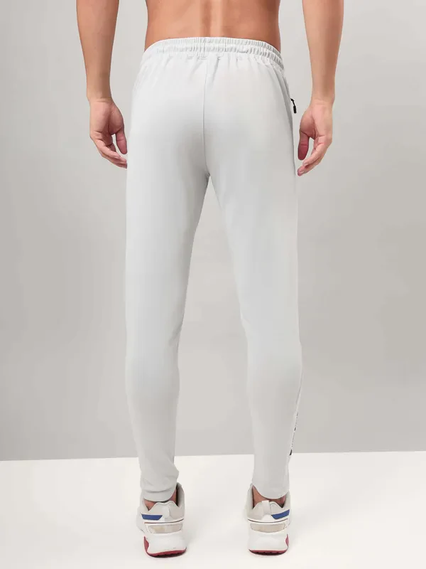 Men Solid Slim Fit Trackpants with ELASTO PLUS - Image 3