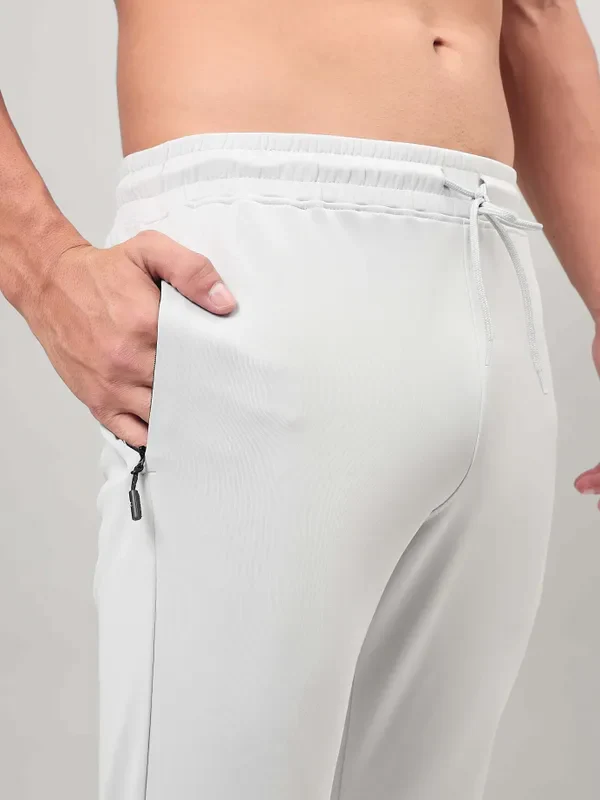 Men Solid Slim Fit Trackpants with ELASTO PLUS - Image 6